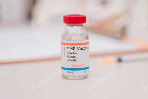 Preview: Measles mumps and rubella vaccine vial doctors counter