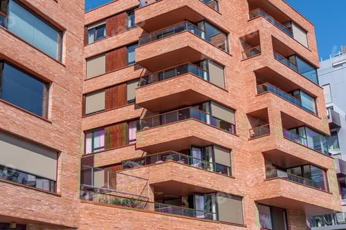 Preview: Modern red multifamily residential buildings