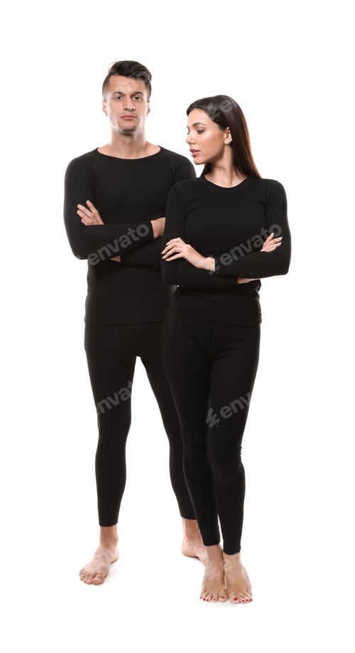 Preview: Couple wearing thermal underwear isolated on white