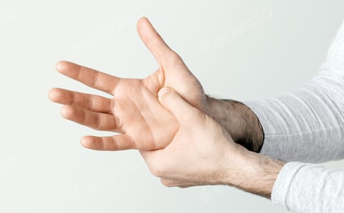 Preview: Body ache. Man presses his hand to hand in pain due to arthritis or injury