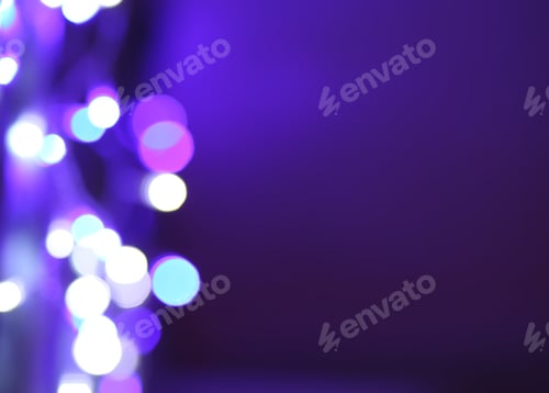 Preview: Abstract bokeh background. Blurred garland lights.