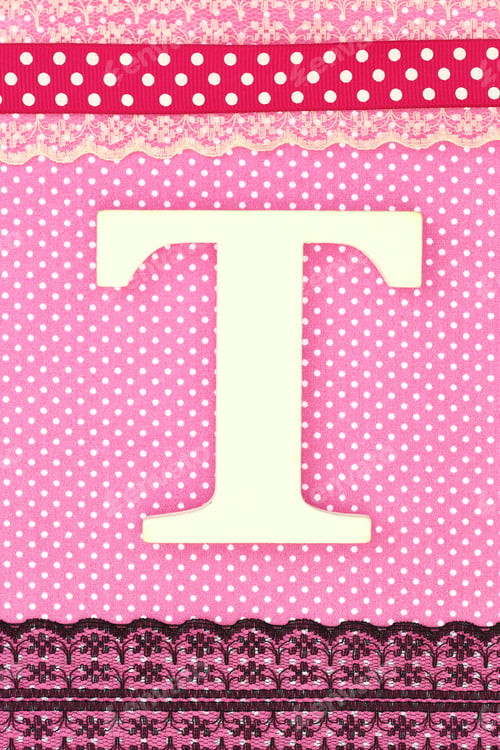 Preview: Wooden letter T on polka dots background