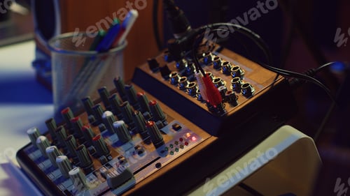 Preview: Electronic instruments used for mixing and recording tunes in empty home studio