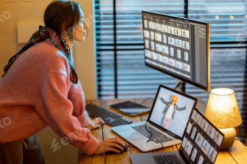 Preview: Photographer editing photos at home office