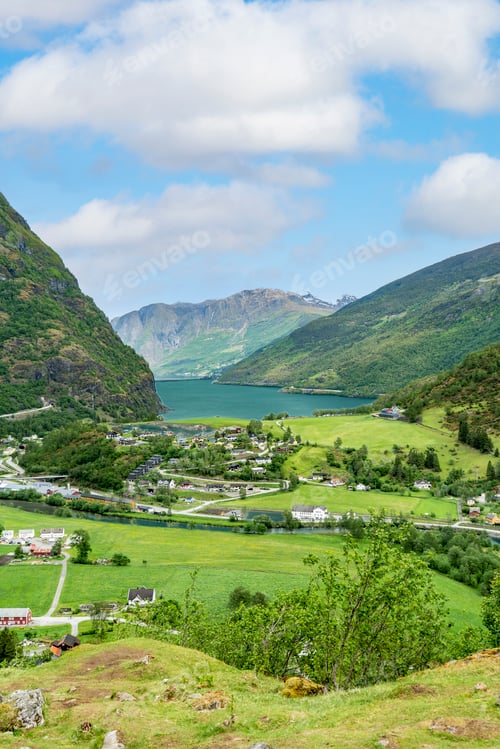 Preview: Expansive view of Flam village and river in a scenic Norwegian valley