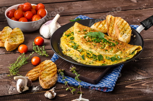 Preview: Herb omelette with chives and oregano sprinkled with Herb omelette with chili flakes