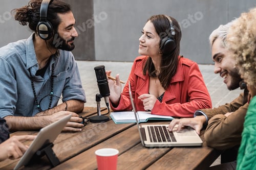 Preview: Group of people record radio podcast together - Young friends talk during live stream session