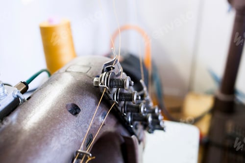 Preview: Close-up of sewing machine at jeans factory