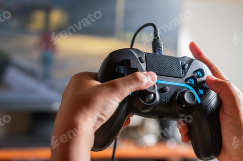 Preview: Hands Holding Gaming Controller