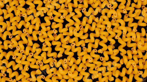 Preview: Italian spiral pasta on black background