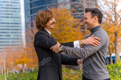 Preview: Caucasian middle aged businessman and executive, colleagues embracing, good work environment