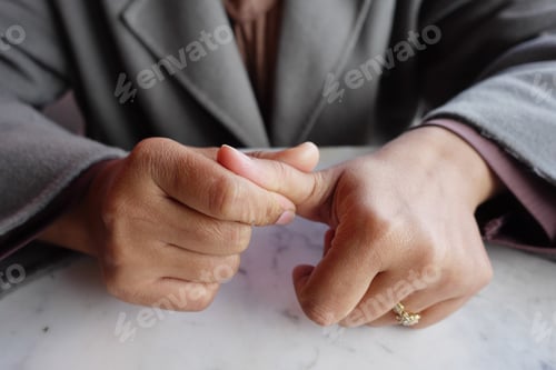Preview: Young women hands suffering thumb finger pain,