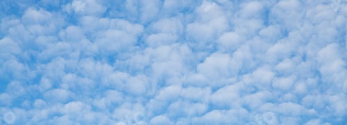 Preview: Sky with white clouds. Copy space empty background.