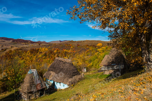 Preview: Mountain hut in autumn forest