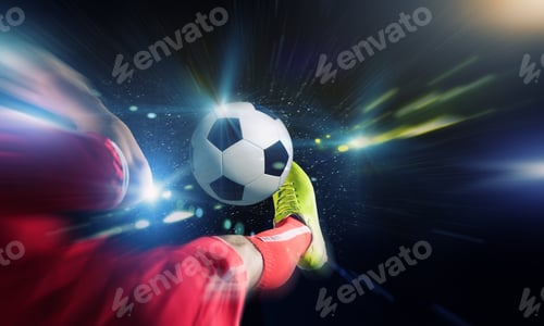 Vista previa: Close Up Image Of Footballer Foot Kicking The Ball