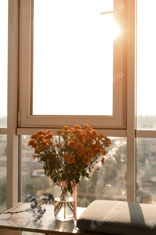Preview: close up view of beautiful bouquet of flowers standing at window
