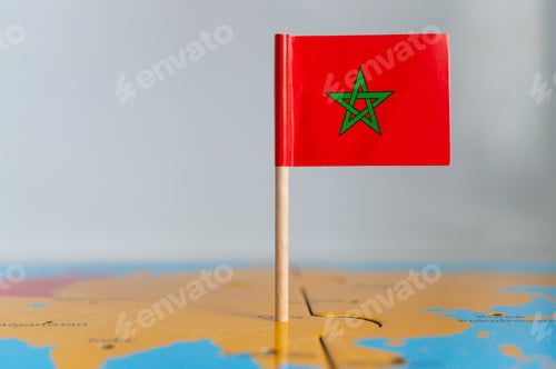 Preview: Small flag of Norway on a wooden stick fixed on the globe