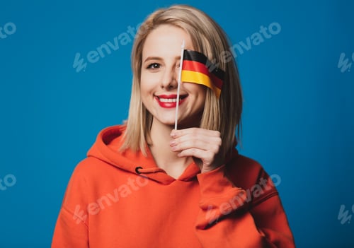 Preview: beatiful girl holds flag of Germany