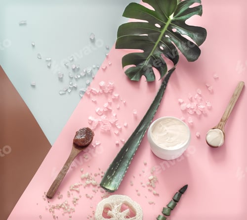 Preview: Spa composition with body care items on a colored background.