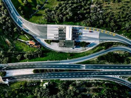 Preview: Aerial view of highway, expressway and motorway with a toll payment point in Italy