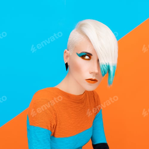 Preview: Fashion model with bright makeup and multi-coloured hair. Art ph