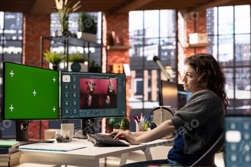 Preview: Focused woman using AI chatbot software and copy space display