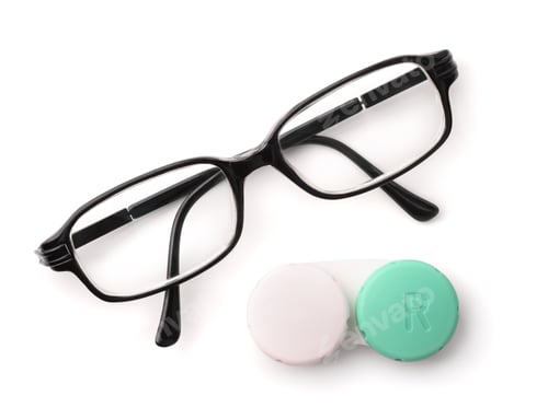 Preview: Top view of eyeglasses and eye contact lenses