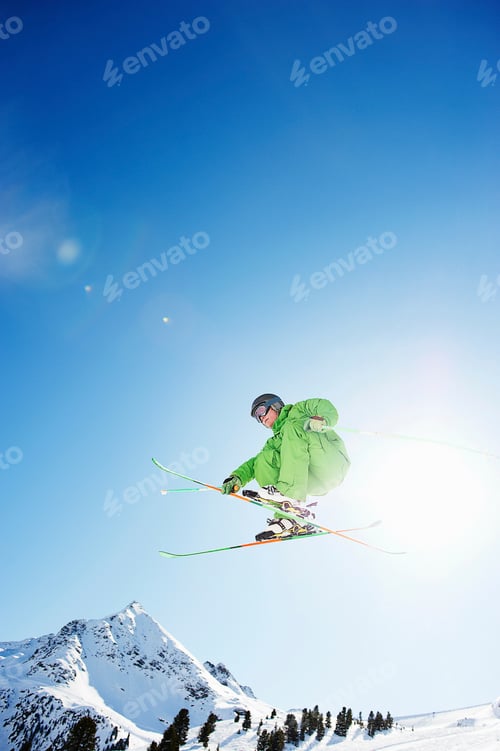 Preview: Skier jumping in midair