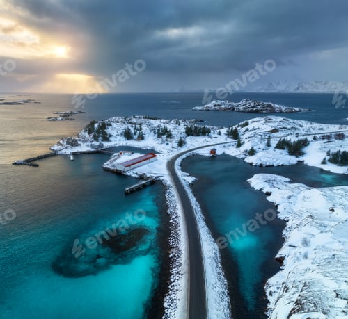 Preview: Aerial view of road, island in snow, rorbu, sea, bridge