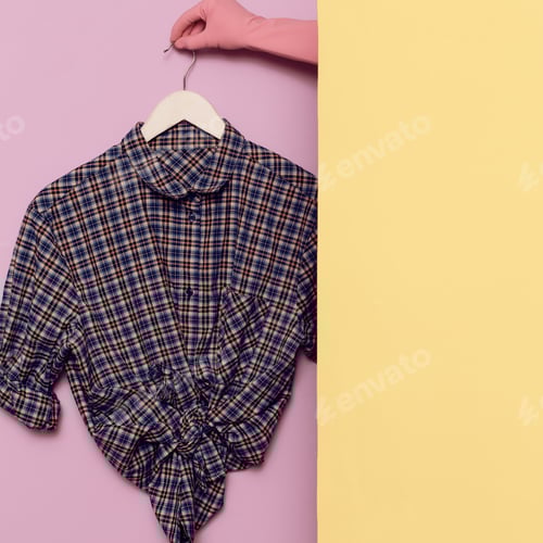 Preview: Plaid Shirt Tied on Hanger with Colorful Background