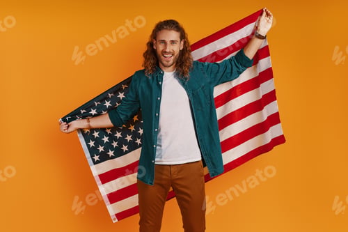 Preview: Happy young man in casual clothing