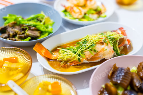 Preview: Chinese family dinner together with asian cuisine food