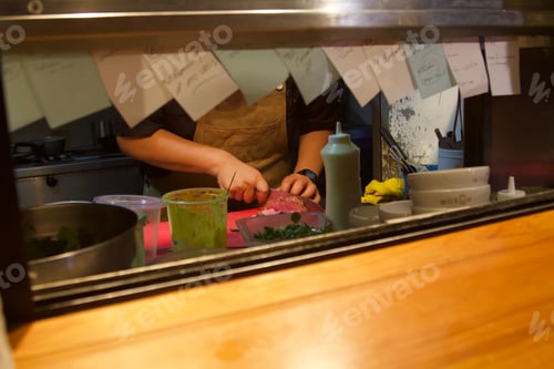 Preview: Chef Preparing Food in a Restaurant Kitchen