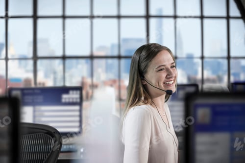 Preview: Teenage female telephonist working in call centre