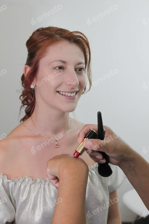 Preview: Woman Getting Makeup Applied Indoors