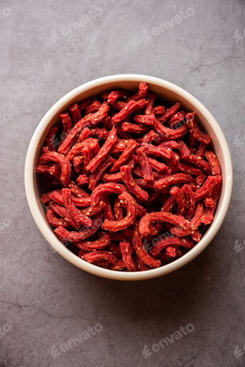 Beatroot chakli sticks made using beetroot, fried tea time snack from India