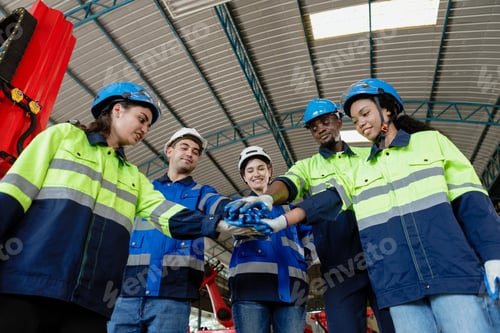 Preview: Successful engineer automation robot technician joining hand. teamwork engineering agreement connect
