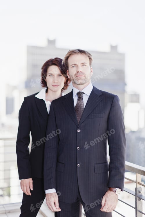 Preview: Business people standing in office
