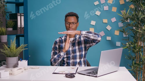 Preview: African american man doing t shape sign with hands