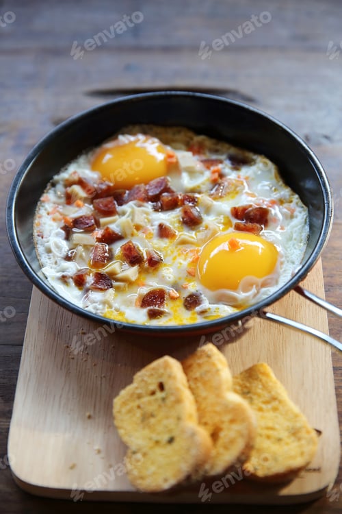 Preview: Brealfast Fried Egg Stuff With Hot Pan With Bread