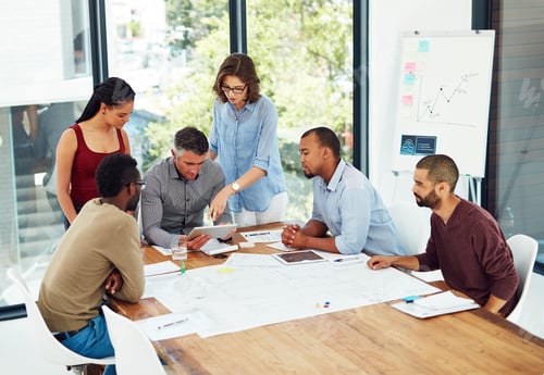Preview: Cropped shot of a group of architects in the boardroom