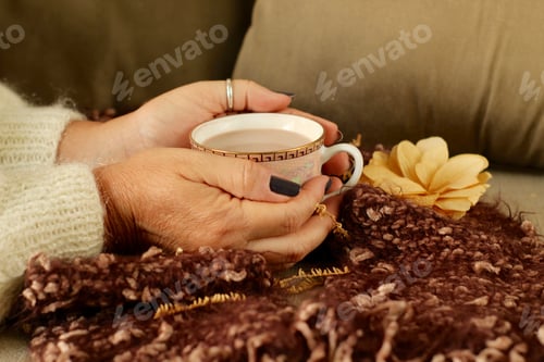 Preview: Cozy Drink in Hands with Flower and Scarf