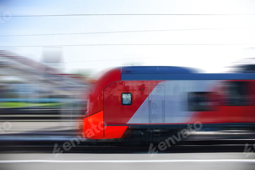 Preview: A modern high-speed train moves along the platform. Motion Blur