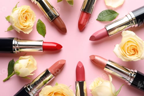 Preview: Flat lay composition with lipsticks and roses on color background