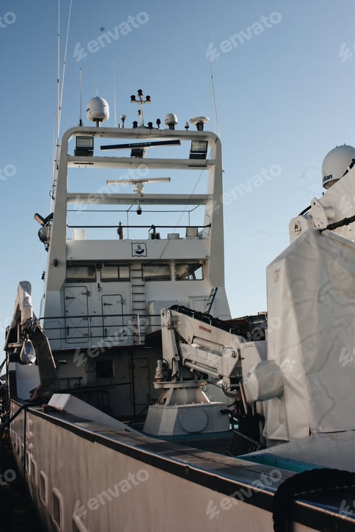 Preview: Modern battleship full of technology and satellites against the blue sky