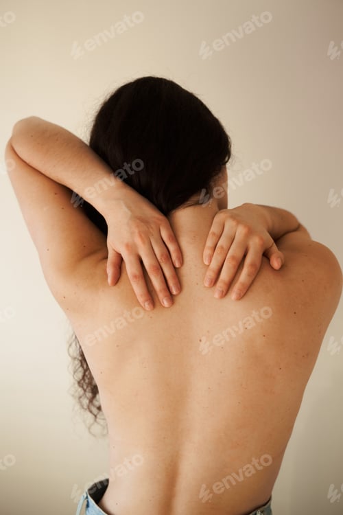 Preview: Young woman with cervical osteochondrosis. Radicular syndrome causing spinal pain