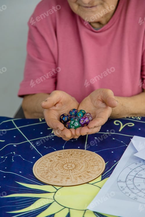 Preview: Woman numerologist astrologer counts numbers. Selective focus. People.
