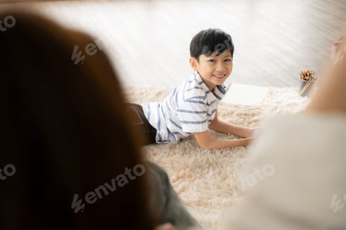Preview: A boy and a daughter from an asian family. The children are having fun in the art of drawing.