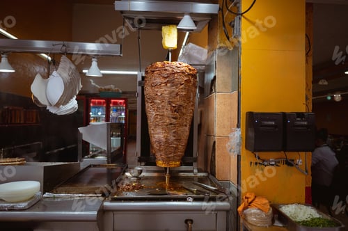 Preview: Trompo de pastor in a taqueria in the city of Mexico
