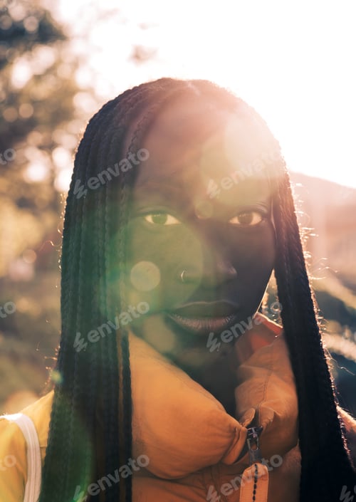 Preview: Close-up outdoor shot of a beautiful young and proud African woman